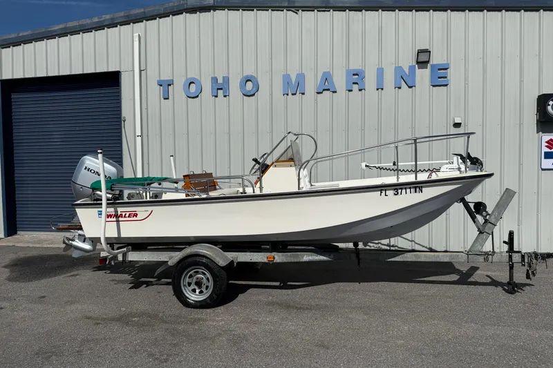 The Image of 1978 Boston Whaler 17 Montauk boat on trailer at Toho Marine. - 1