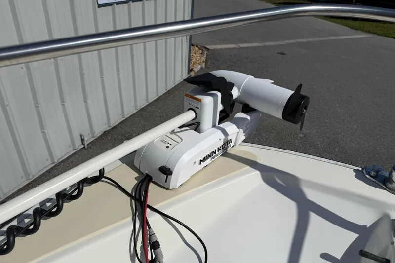 Slide: The Image of Minn Kota trolling motor mounted on a 1978 Boston Whaler 17 Montauk boat. - 13