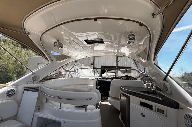Slide: The Image of Interior of 2006 Regal Commodore 3860 yacht with luxurious seating and modern amenities. - 29