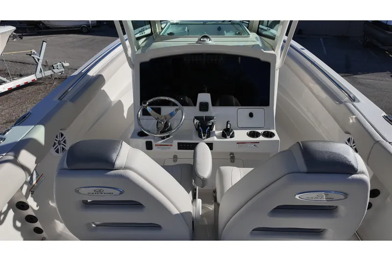 Slide: The Image of 2026 Sailfish 272 CC boat cockpit with steering wheel and control panel. - 4