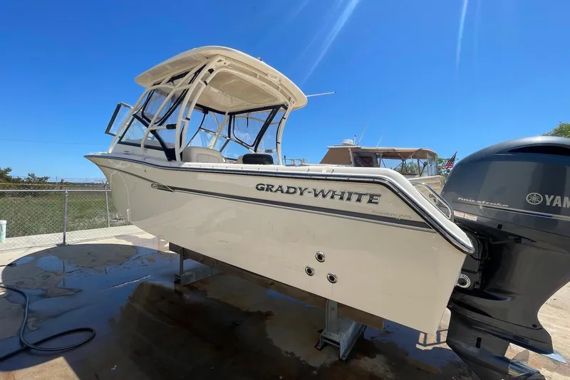 Slide: The Image of 2015 Grady-White Freedom 275 boat on display, featuring Yamaha outboard motor. - 7