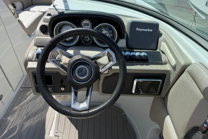 Slide: The Image of Steering console of 2019 Crownline Eclipse E235 XS with Raymarine navigation system. - 15