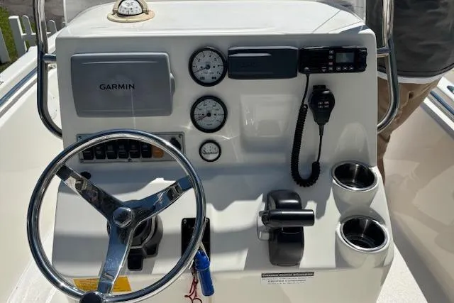 Slide: The Image of Console of a 2013 Key West 189 FS boat with Garmin navigation system. - 13