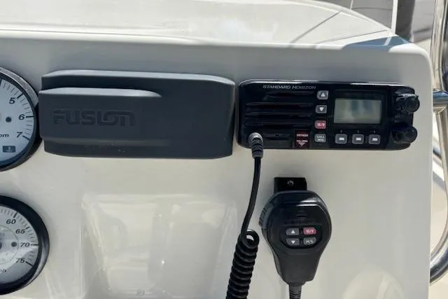 Slide: The Image of Dashboard of 2013 Key West 189 FS boat with radio and gauges. - 14