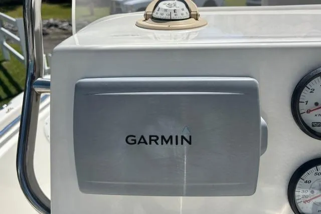 Slide: The Image of Garmin device on 2013 Key West 189 FS boat dashboard with compass and gauges. - 15