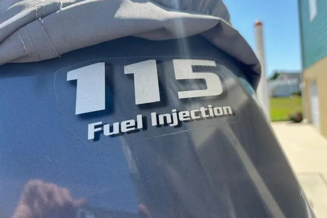 Slide: The Image of Close-up of 2013 Key West 189 FS outboard engine with 115 Fuel Injection label. - 7