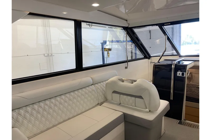 Slide: The Image of Interior of 2024 Regal 36 Grande Coupe with luxurious seating and modern design. - 2