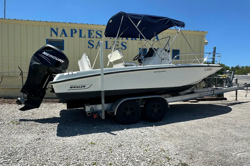 The Image of 2007 Boston Whaler 200 Dauntless boat on trailer at Naples Marina Sales. - 1