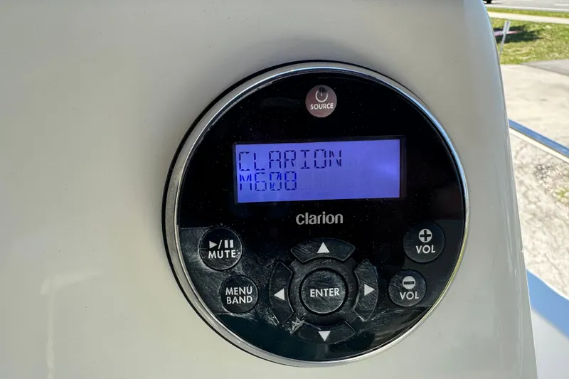 Slide: The Image of Clarion audio system on 2007 Boston Whaler 200 Dauntless boat dashboard. - 10