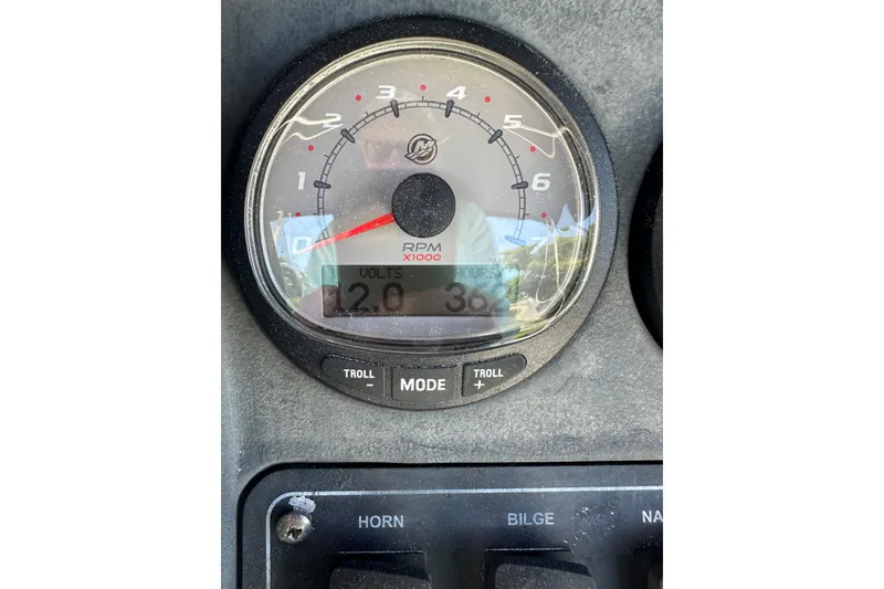 Slide: The Image of Close-up of a 2007 Boston Whaler 200 Dauntless boat tachometer displaying 12 volts and 362 hours. - 20