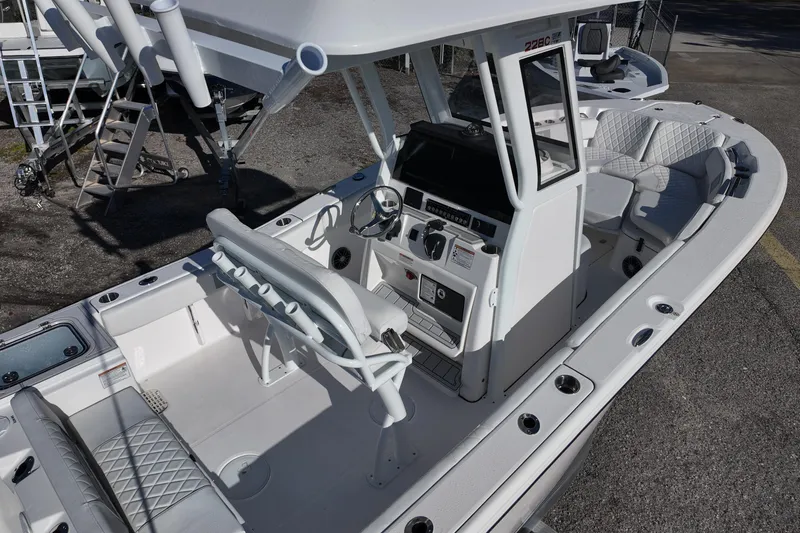 Slide: The Image of 2026 Sea Fox 228 Commander boat interior with seating and console. - 4