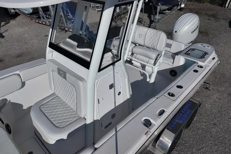 Slide: The Image of 2026 Sea Fox 228 Commander boat interior with white seating and Yamaha engine. - 9