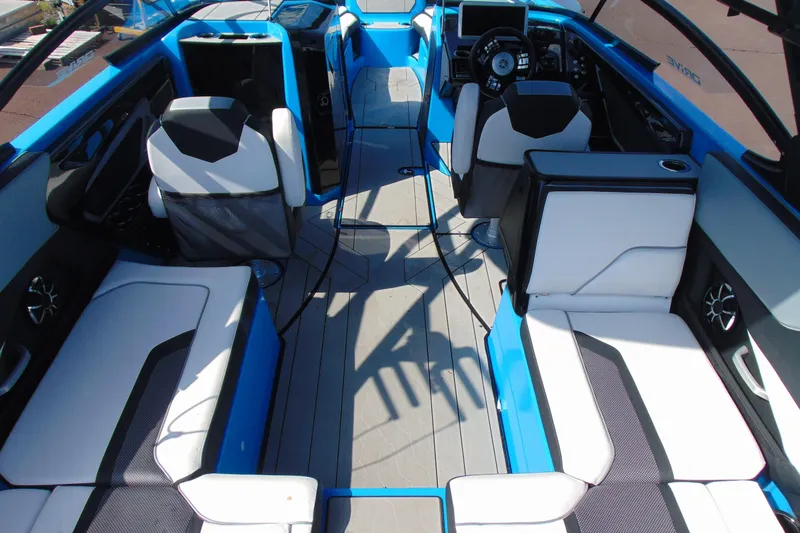 Slide: The Image of 2022 Yamaha Boats 255XD interior with modern seating and sleek design. - 10