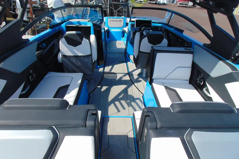 Slide: The Image of 2022 Yamaha Boats 255XD interior with modern seating and sleek design. - 8