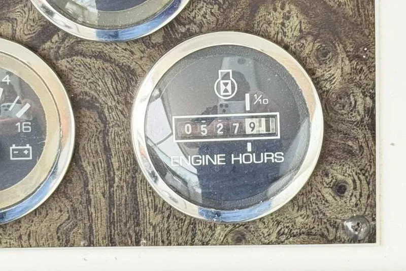 Slide: The Image of Engine hour meter showing 5279 hours on 1998 Sea Ray 370 Express Cruiser. - 28