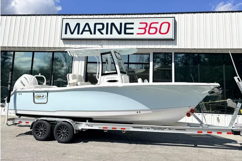 The Image of 2026 Sea Hunt Ultra 255 SE boat on trailer at Marine 360 dealership. - 0