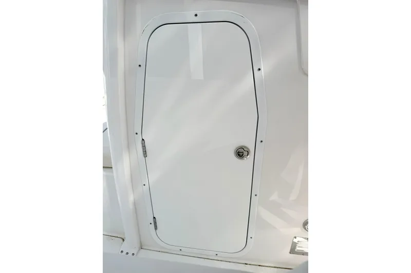 Slide: The Image of White cabin door on 2026 Sea Hunt Ultra 255 SE boat. - 23