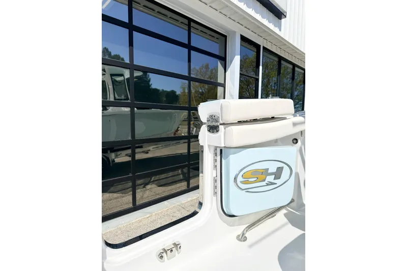 Slide: The Image of 2026 Sea Hunt Ultra 255 SE boat detail with SH logo and modern design. - 4
