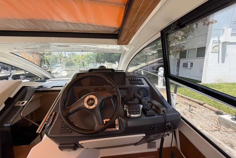 Slide: The Image of Interior of 2013 Cranchi Endurance 41 yacht, featuring stairs and modern kitchen area. - 10