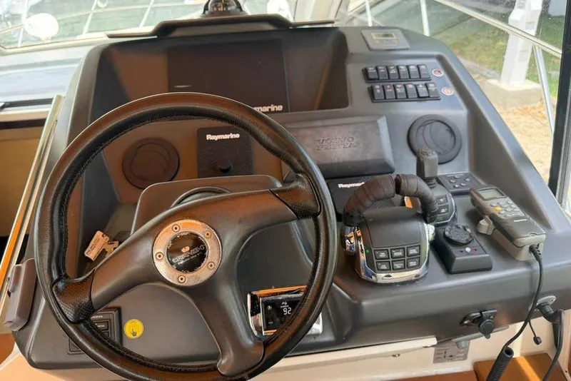 Slide: The Image of Interior of 2013 Cranchi Endurance 41 yacht with cozy seating and stylish cushions. - 12