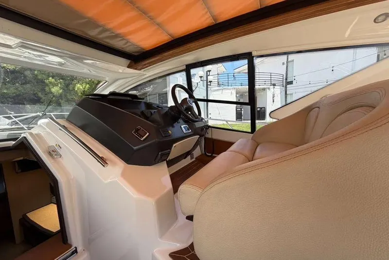Slide: The Image of Interior cabin of 2013 Cranchi Endurance 41 yacht with cozy beds and ambient lighting. - 14