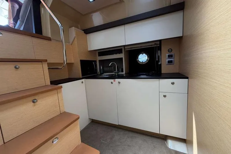 Slide: The Image of Luxurious cabin interior of 2013 Cranchi Endurance 41 yacht with cozy bedding and modern decor. - 17