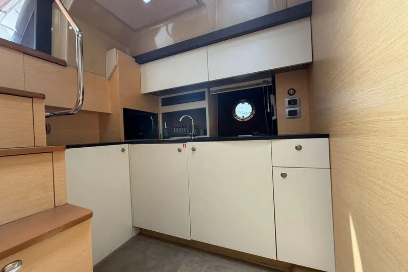 Slide: The Image of Luxurious cabin interior of 2013 Cranchi Endurance 41 yacht with cozy bedding and modern design. - 18