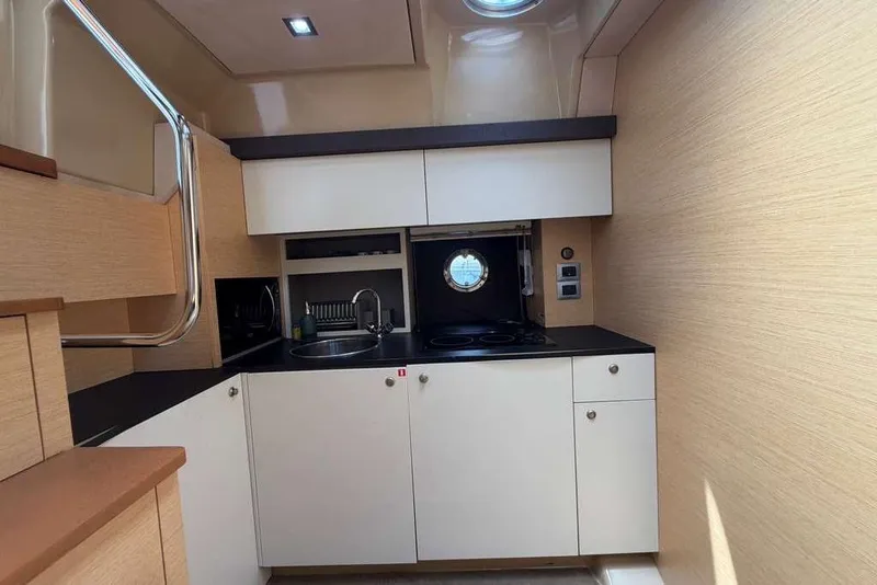 Slide: The Image of Luxurious bedroom interior of 2013 Cranchi Endurance 41 yacht with cozy bedding. - 19