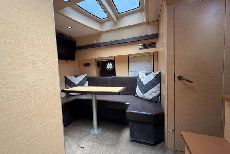 Slide: The Image of Luxurious cabin interior of 2013 Cranchi Endurance 41 yacht with cozy bed and pillows. - 20
