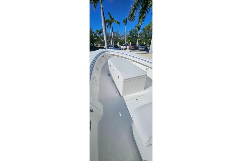 Slide: The Image of 2007 SeaCraft SC32 Master Angler boat deck with seating, under clear blue sky. - 10