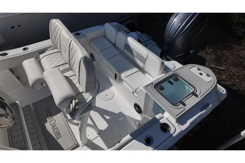 Slide: The Image of 2026 Sea Fox 228 Commander boat interior with seating and storage features. - 12