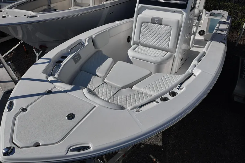 Slide: The Image of 2026 Sea Fox 228 Commander boat interior with cushioned seating and sleek design. - 9