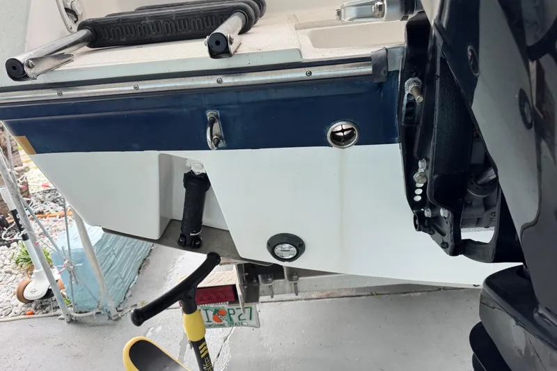 Slide: The Image of Bathroom sink area in a 2004 Stamas 290 Express boat with soap and toilet paper. - 13