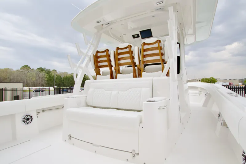 Slide: The Image of Luxurious interior of 2026 Regulator 37 boat with plush seating and modern design. - 17