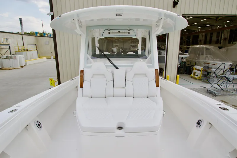 Slide: The Image of 2026 Regulator 37 boat interior with white seating and modern design. - 33