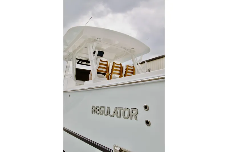 Slide: The Image of 2026 Regulator 37 boat with sleek design and modern seating. - 6