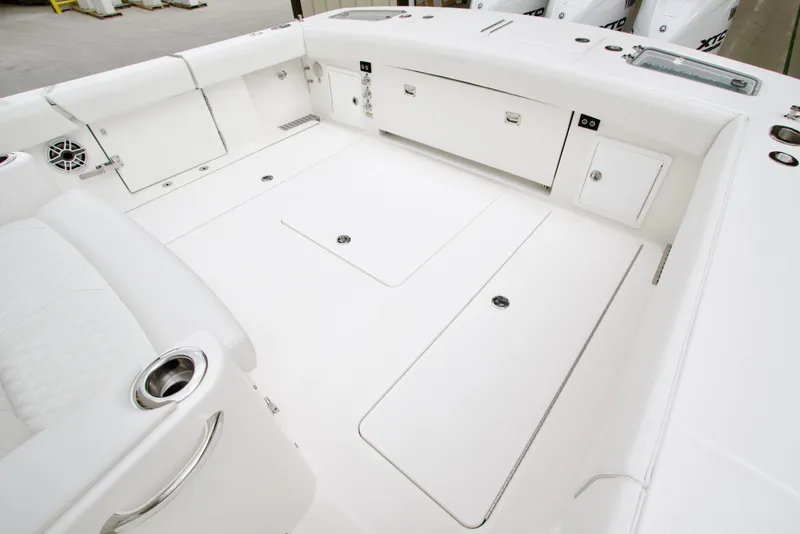 Slide: The Image of Spacious deck of 2026 Regulator 37 boat with storage compartments. - 9