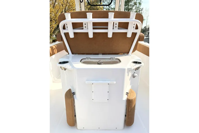 Slide: The Image of 2023 Sea Hunt Ultra 255 SE boat interior with seating and rod holders. - 26
