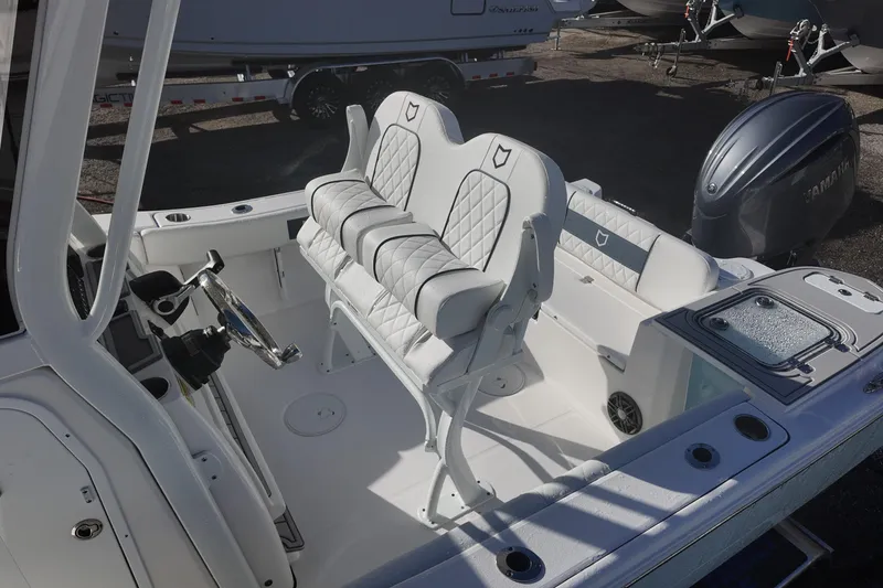 Slide: The Image of 2026 Sea Fox 228 Commander boat interior with dual seats and Yamaha engine. - 10