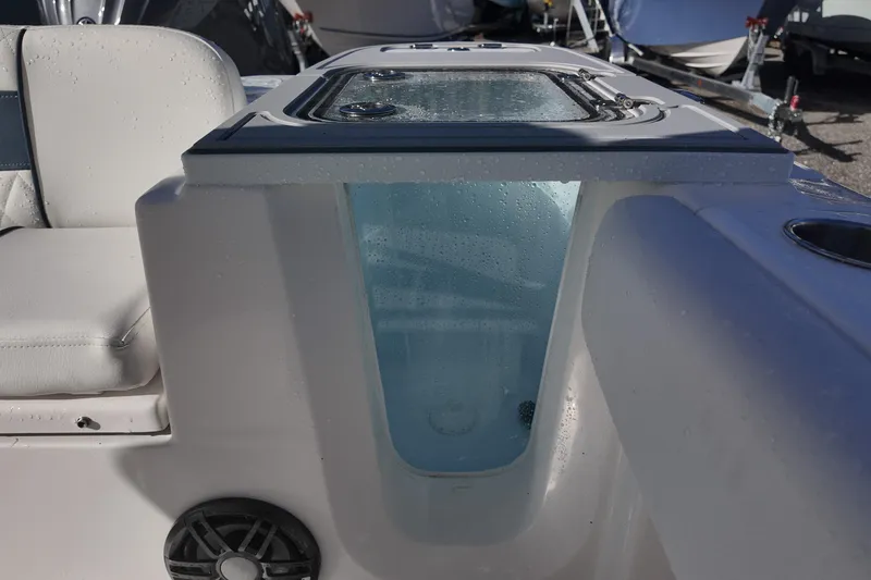 Slide: The Image of 2026 Sea Fox 228 Commander boat interior with livewell and seating detail. - 12