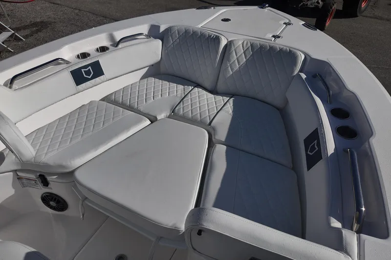 Slide: The Image of Luxurious seating on 2026 Sea Fox 228 Commander boat with quilted upholstery and cup holders. - 7