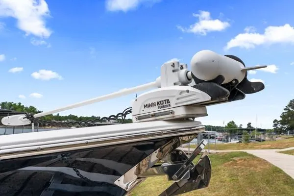 Slide: The Image of 2018 Sea Hunt Gamefish 27 with Minn Kota Terrova trolling motor, docked outdoors. - 10