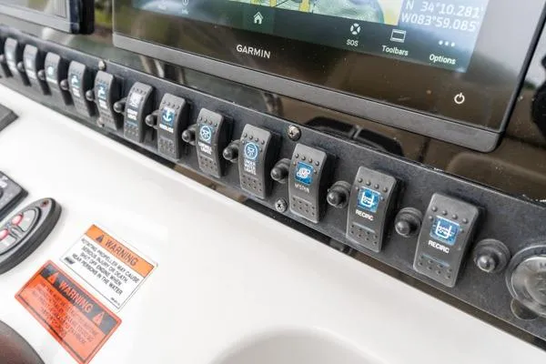 Slide: The Image of Control panel of a 2018 Sea Hunt Gamefish 27 boat with Garmin display. - 31