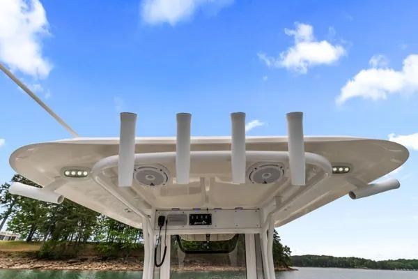 Slide: The Image of 2018 Sea Hunt Gamefish 27 boat top view with rod holders and speakers. - 41