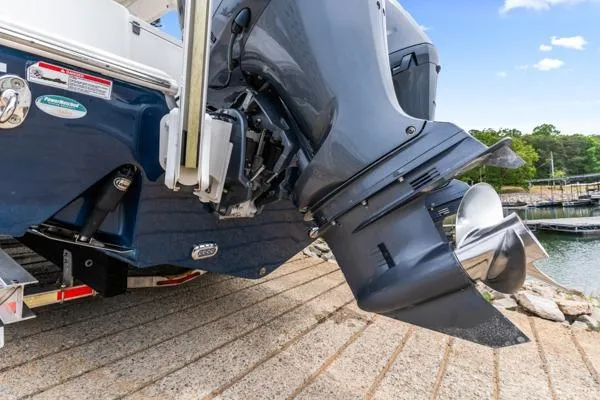 Slide: The Image of 2018 Sea Hunt Gamefish 27 boat engine close-up at a dock. - 8