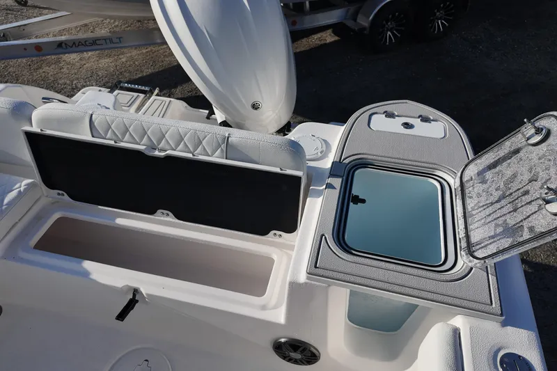 Slide: The Image of 2026 Sea Fox 248 Commander boat interior with storage compartments and seating. - 14