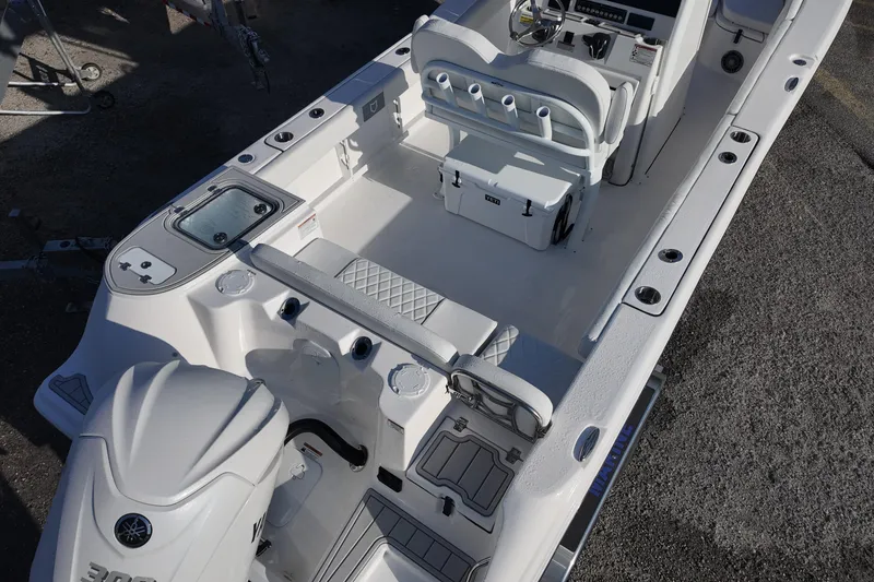 Slide: The Image of 2026 Sea Fox 248 Commander boat interior with seating and storage compartments. - 4