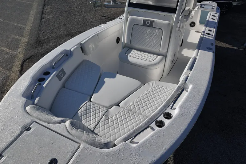 Slide: The Image of 2026 Sea Fox 248 Commander boat interior with white cushioned seating. - 8