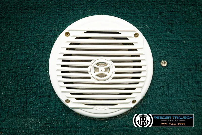 Slide: The Image of White speaker grille on green carpet, Godfrey SW2423, 1998 model. - 31