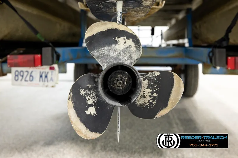 Slide: The Image of Close-up of a worn boat propeller on a trailer, Godfrey SW2423, 1998 model. - 37
